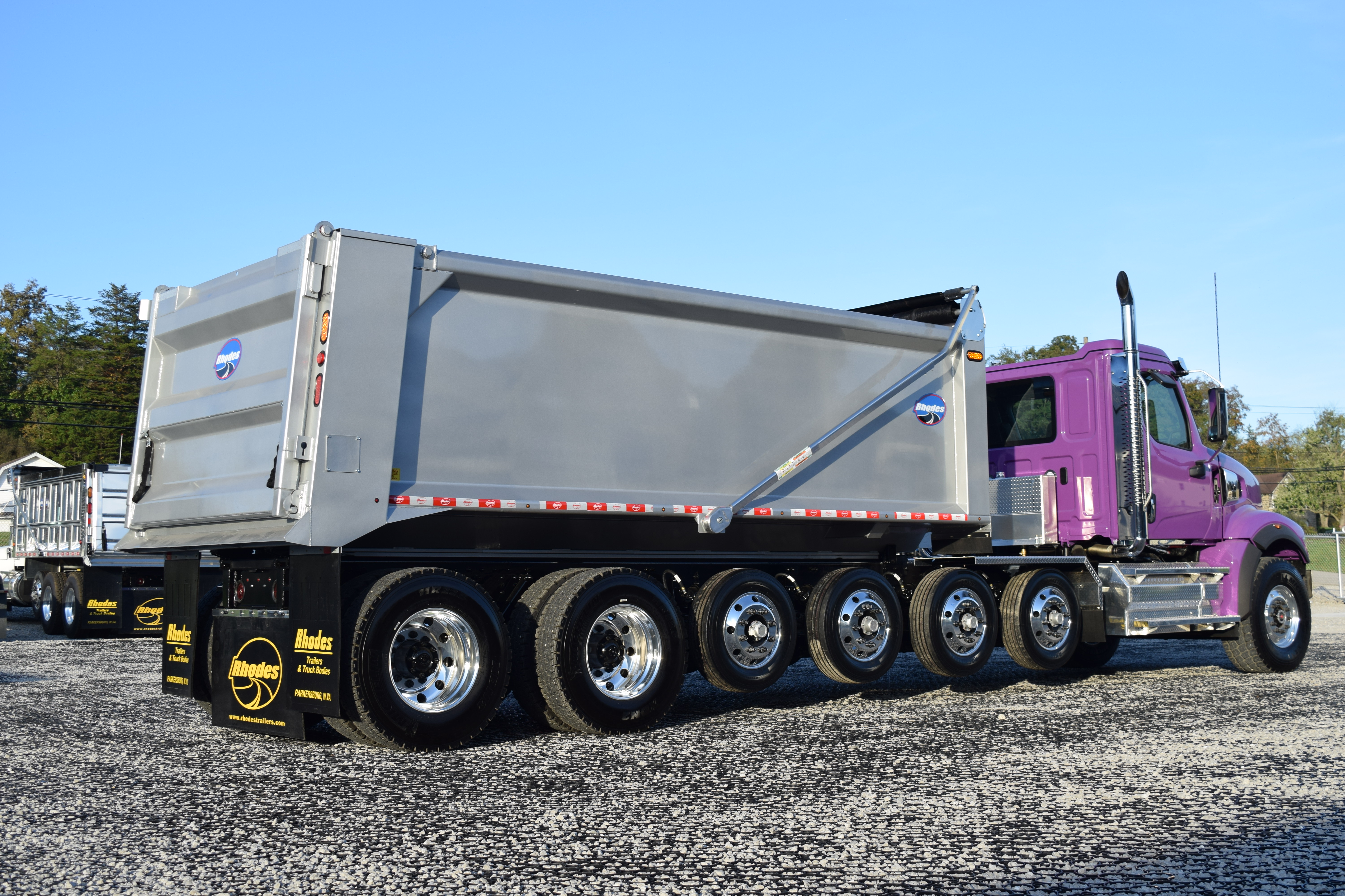 Gray Rhodes Western Truck Body on a Purple Cab and Chassis
